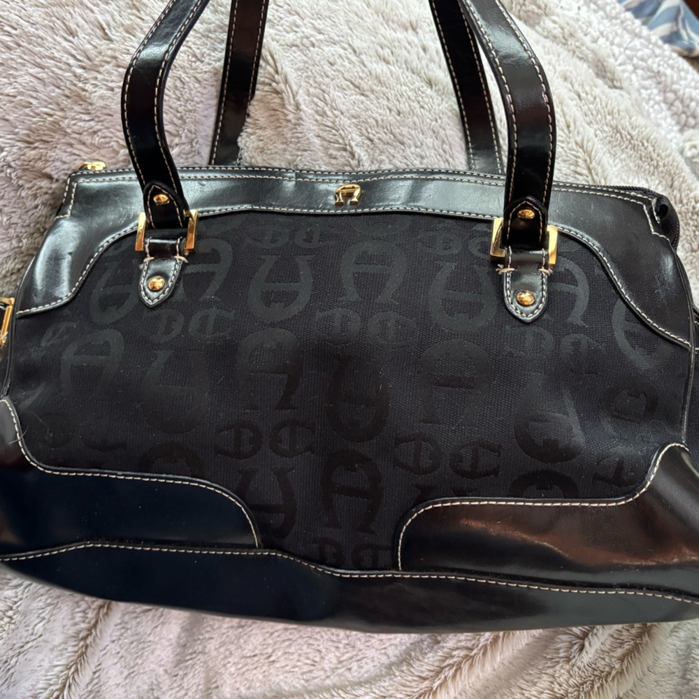 Etienne Aigner Black Shoulder Bag with Structured Design and Monogram Detailing